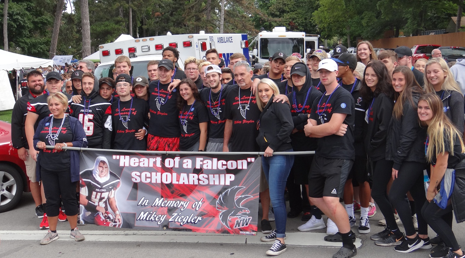 Pictured are the walkers who showed up to honor Michael Ziegler and the `Heart of a Falcon` Scholarship. (Photo by Lorna Tilley-Peltier)